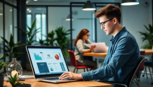 Hombre trabajando en computadora portátil con gráficos.